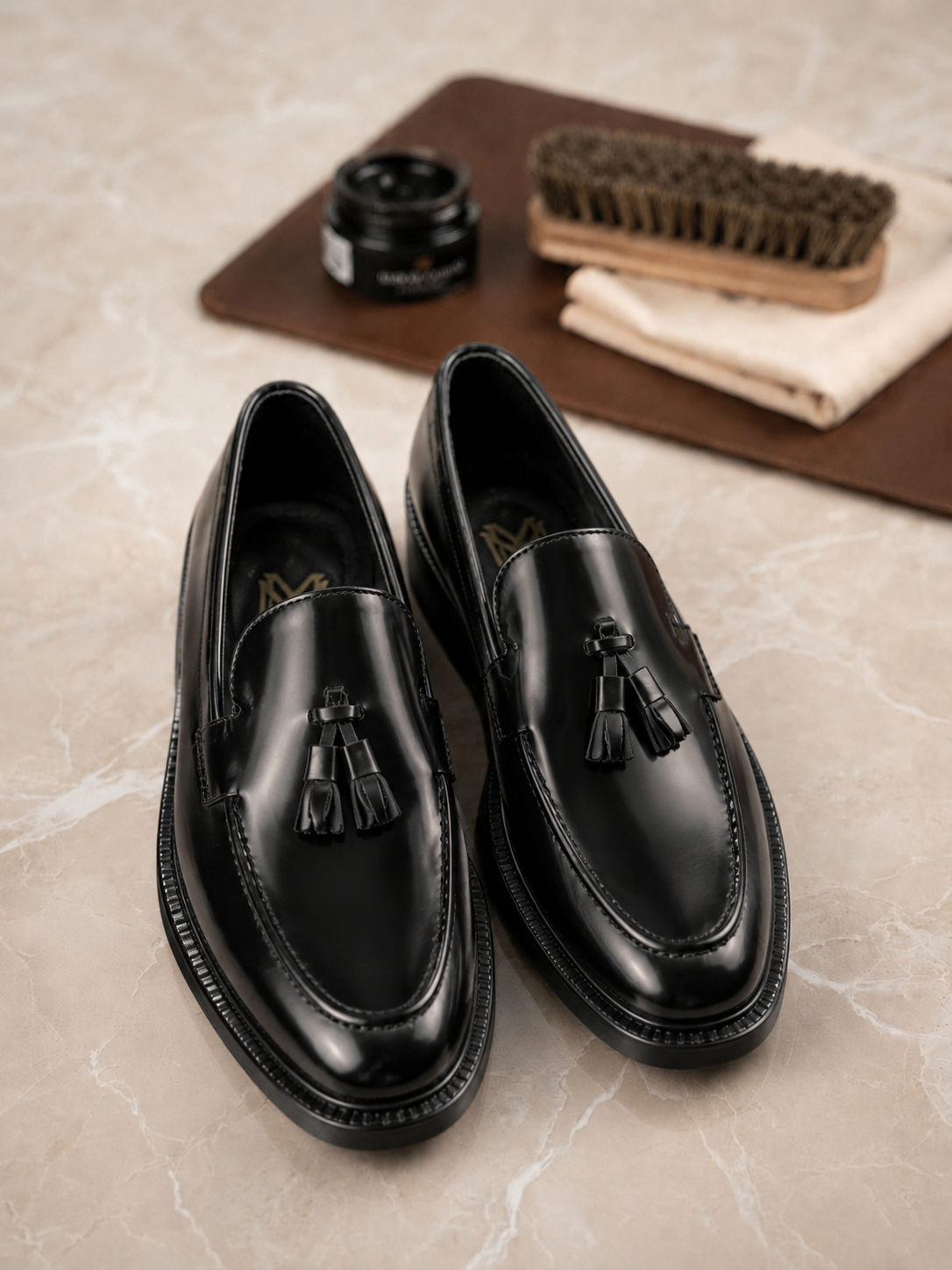 Noir Tassel Loafers